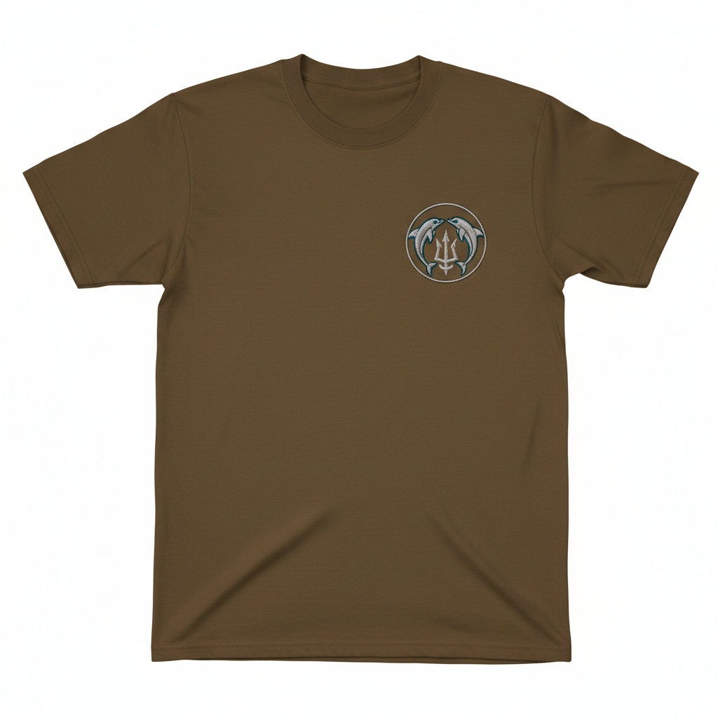 Coyote brown t-shirt with 3.5 inch embroidered silver dolphin crest with teal blue accents